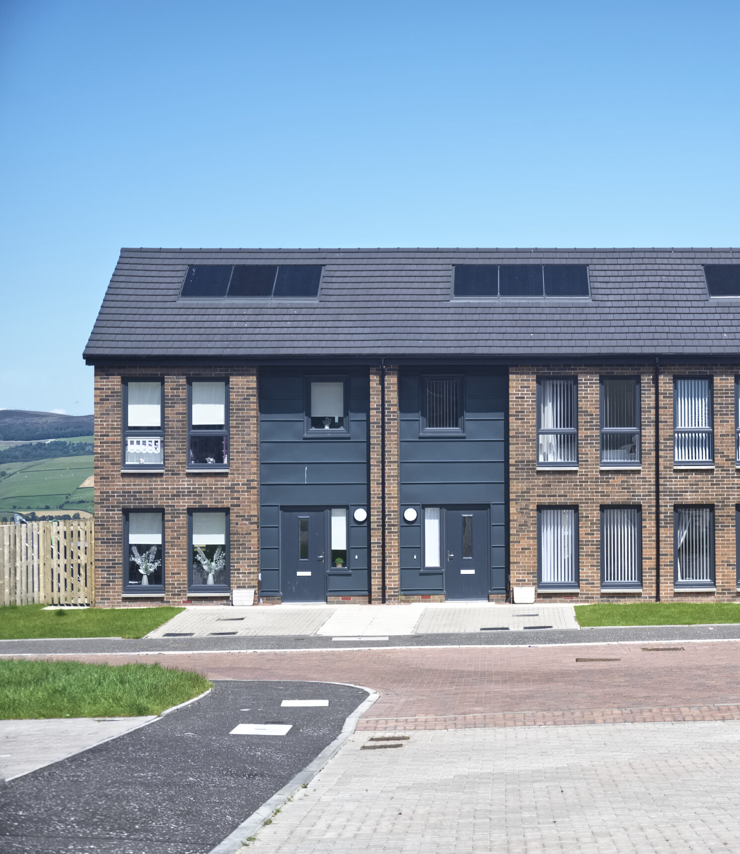 Terraced homes with solar panels in the East Midlands